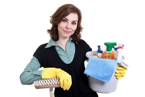 Staff using PPE during a carpet cleaning appointment